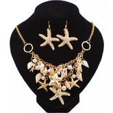 Jewelry set with necklace and earrings on a black stand