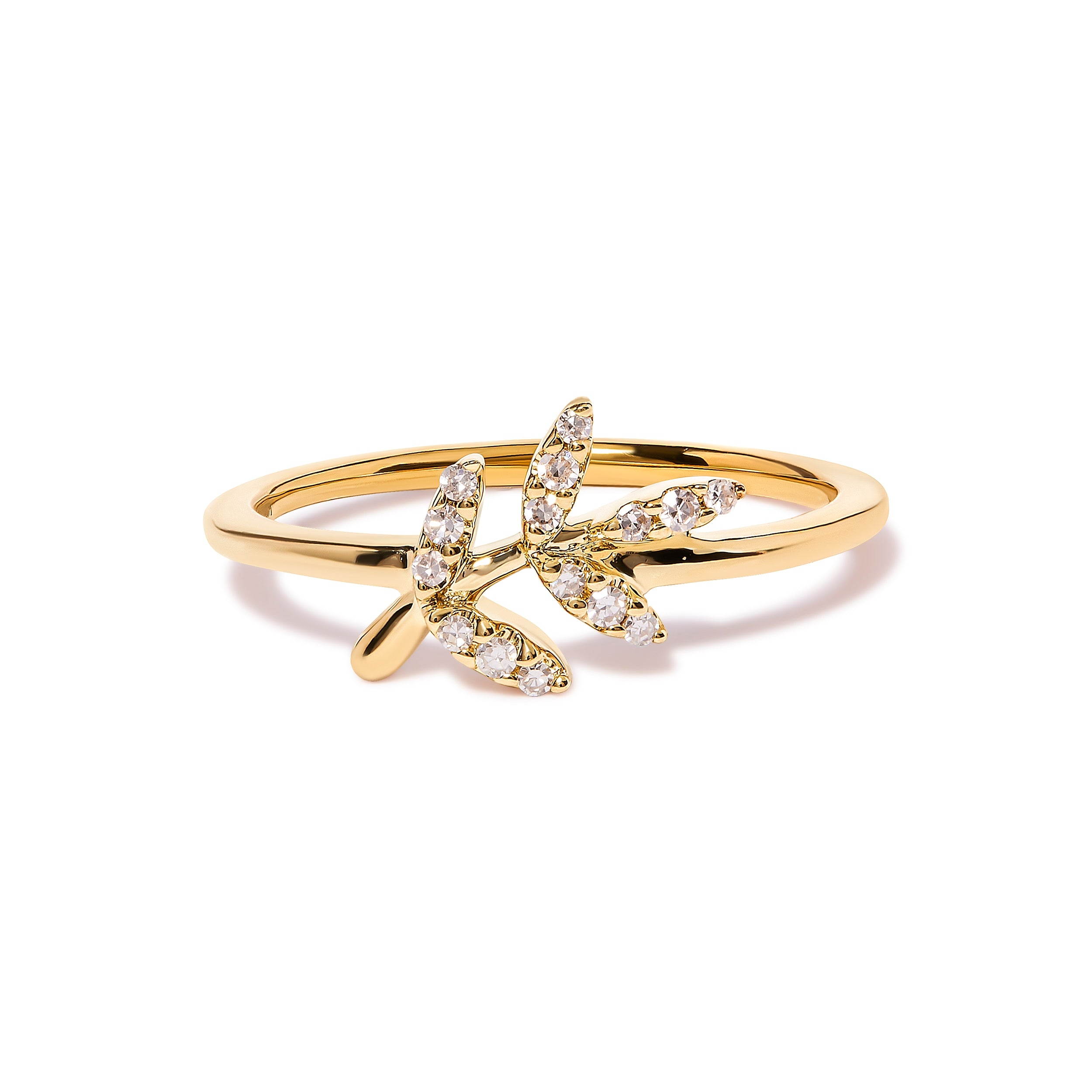 Gold ring with a leaf-shaped design on a white background