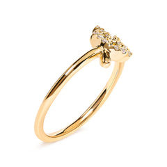 Gold ring with a diamond on a white background