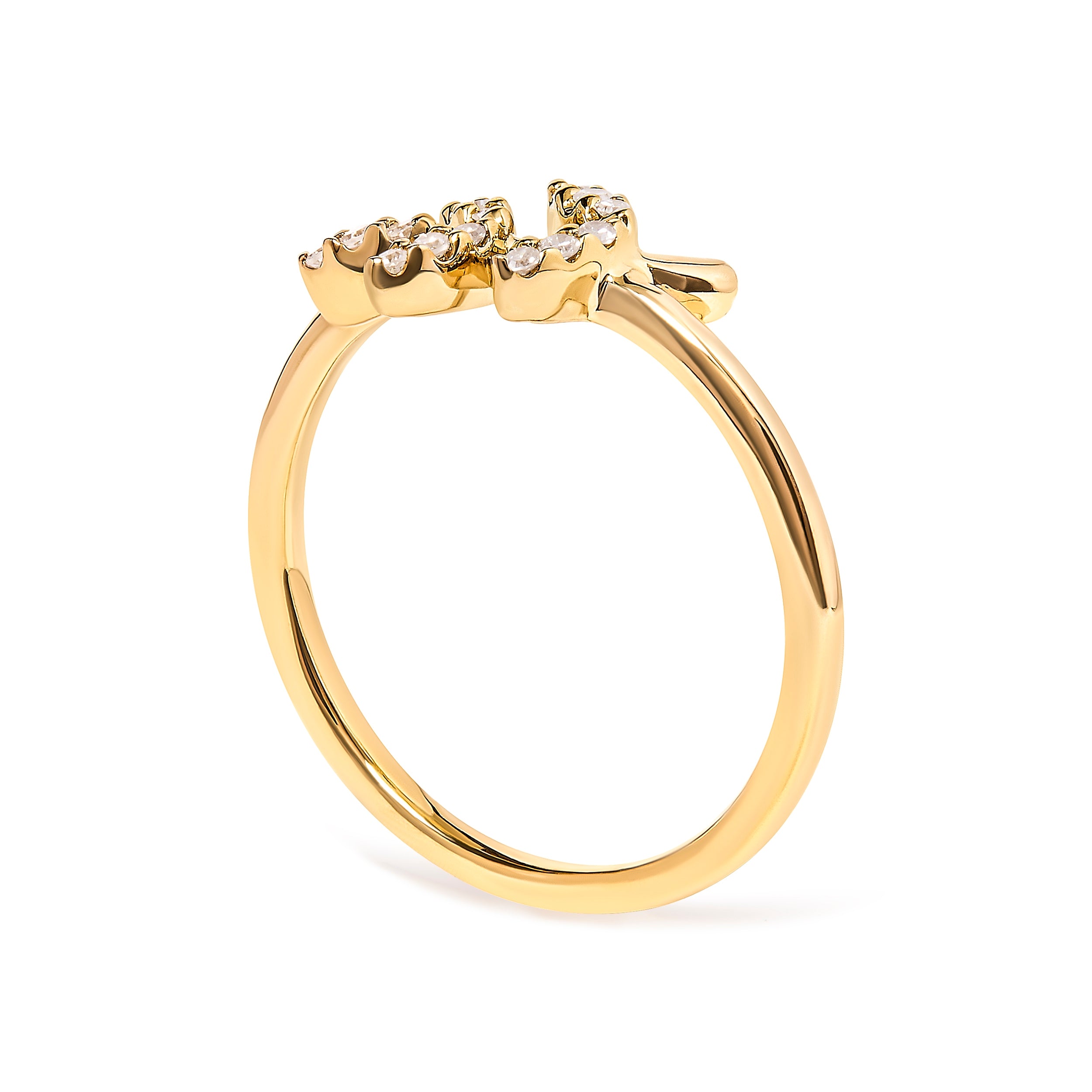 Gold ring with diamond accents on a white background
