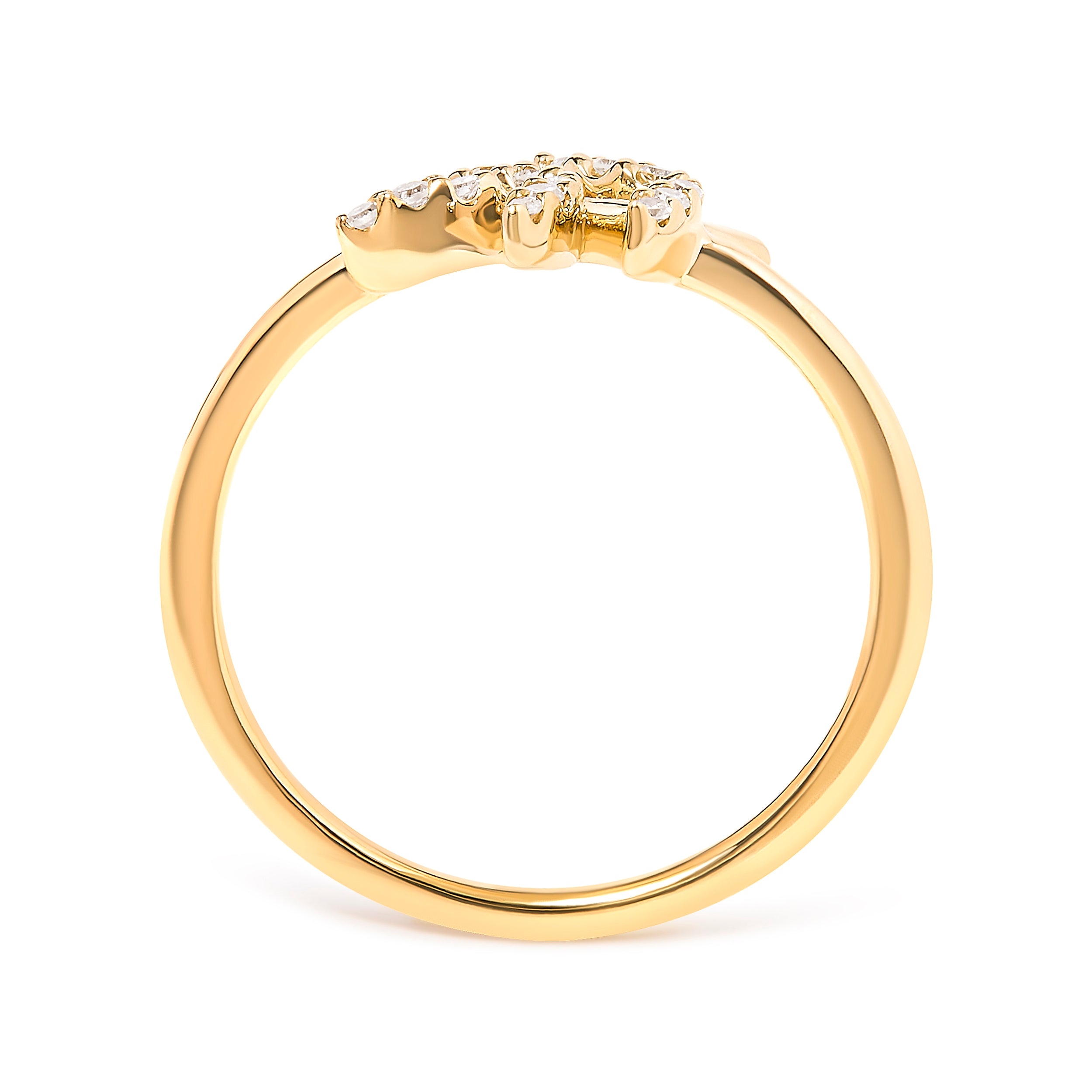 Gold ring with small diamonds on a white background