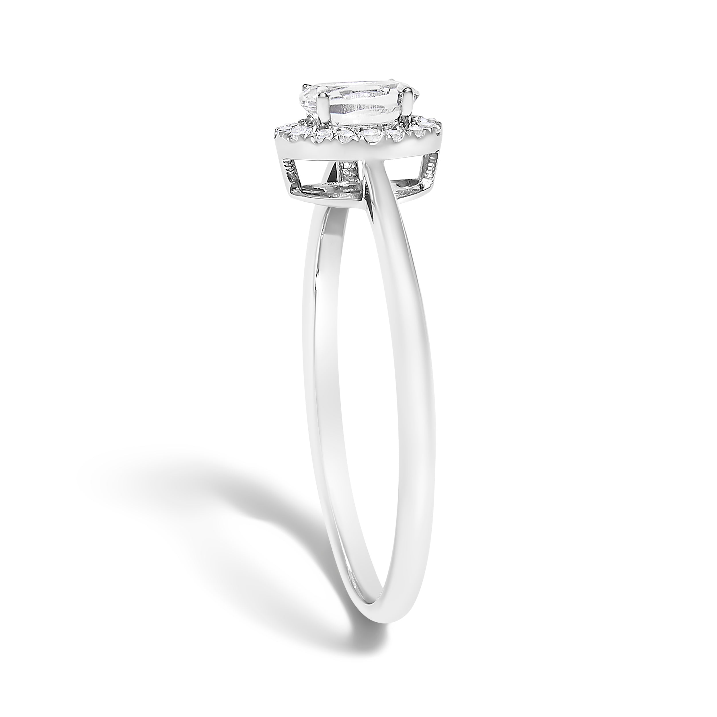10K White Gold 5X3MM Oval White Topaz and Diamond Accent Halo Ring (I-J Color, I1-I2 Clarity) - Ring Size 5.5