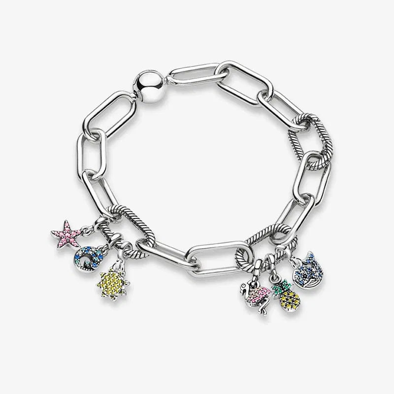 Silver bracelet with colorful charms on a white background