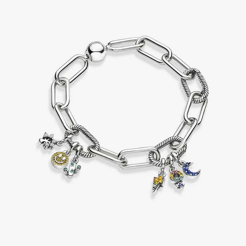 Silver bracelet with charms on a white background