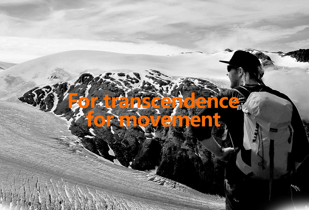 Person with a backpack looking at snowy mountains with text 'For transcendence for movement'.