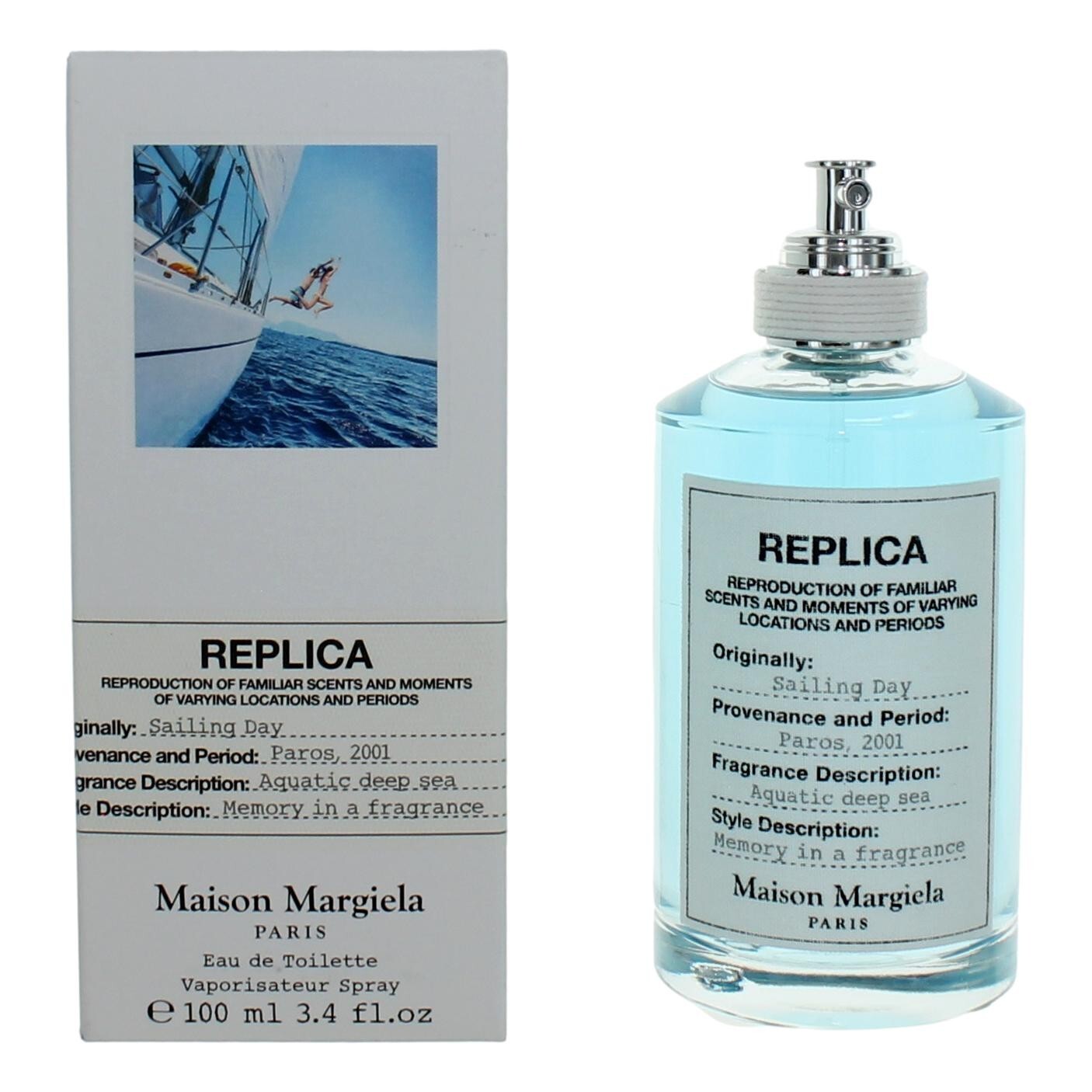 Maison Margiela Replica香水瓶及其包装盒，背景为帆船图片