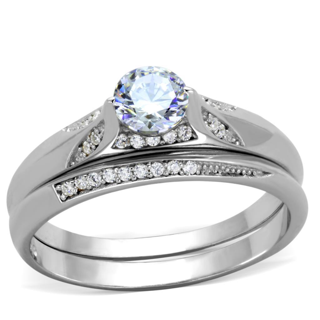 Silver ring with a central gemstone and smaller diamonds on a white background